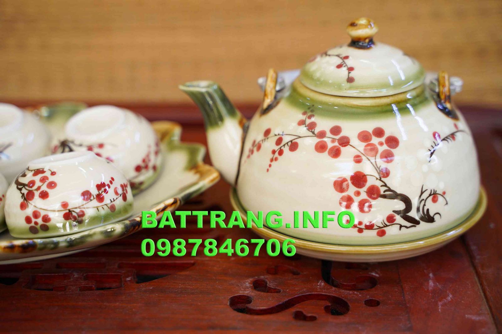HV10- Bộ ấm chén dáng vuôt khay lá vẽ hoa đào đỏ BátTràng