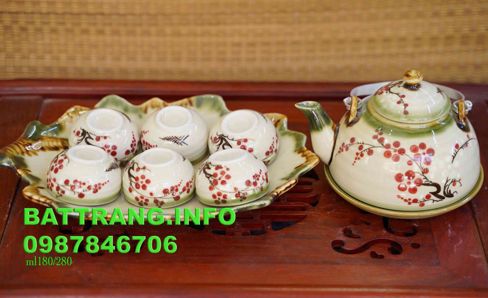 HV10- Bộ ấm chén dáng vuôt khay lá vẽ hoa đào đỏ BátTràng